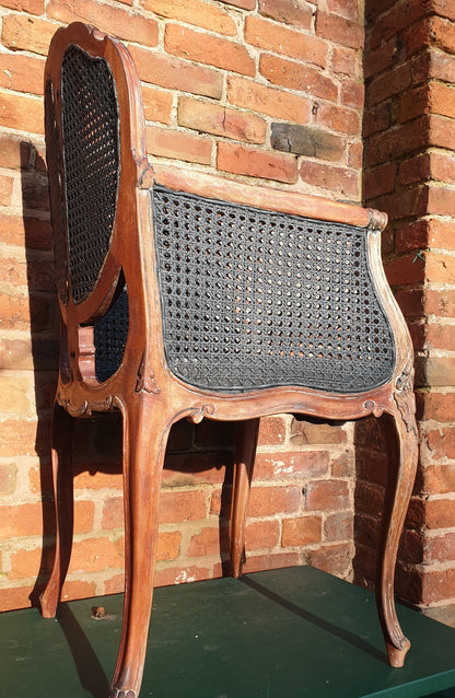 Vintage cane armchair.