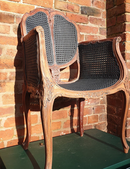 Vintage cane armchair.