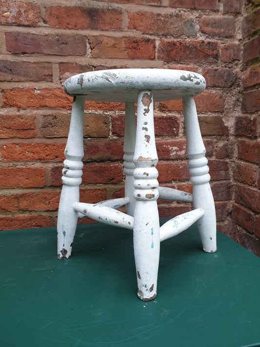 Small round white wooden stool